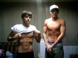 Young guys flexing muscles